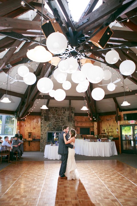 A couple shares their first dance at Loon Mountain.